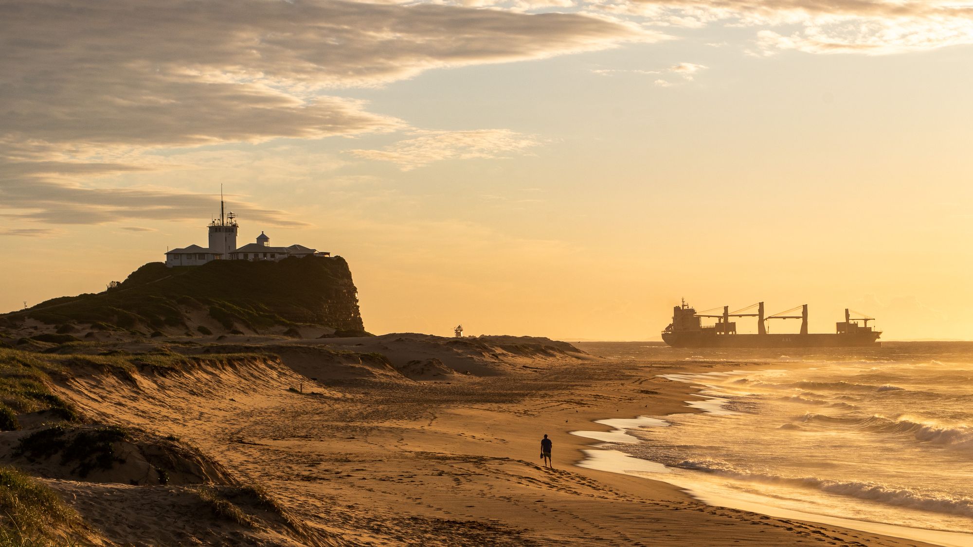 Nobbys Beach and Nobbys Lighthouse at sunset, Newcastle